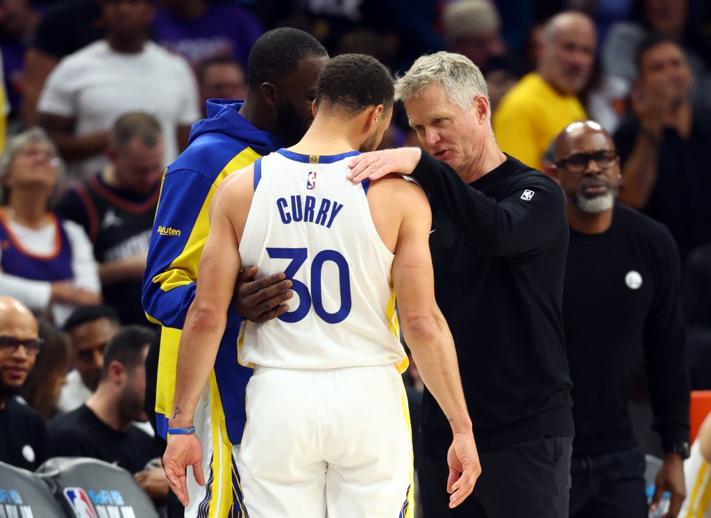 NBA player Stephen Curry with his coach Steve Kerr and teammate Draymond Green on the court.