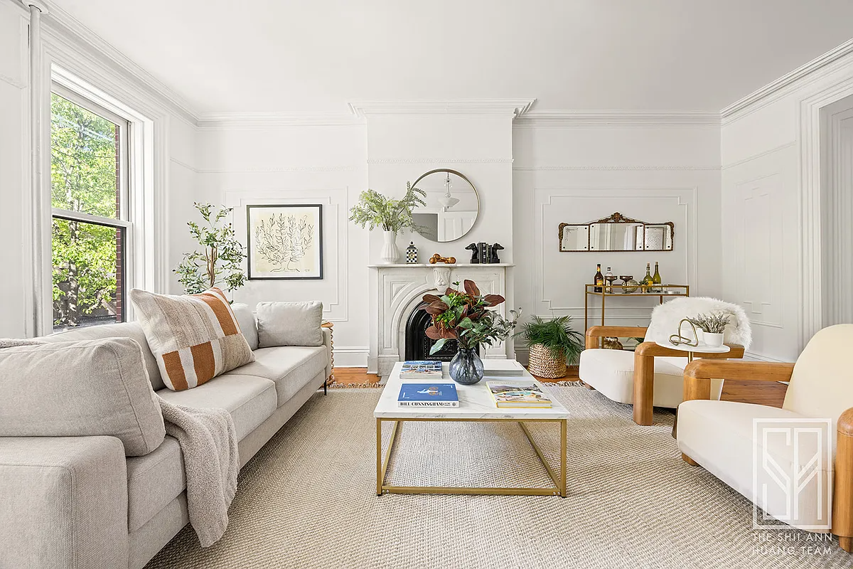 parlor with mantel, white walls