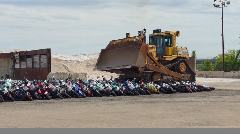 Hundreds of illegal mopeds seized by NYPD are crushed in Staten Island Wednesday, May 13, 2026.