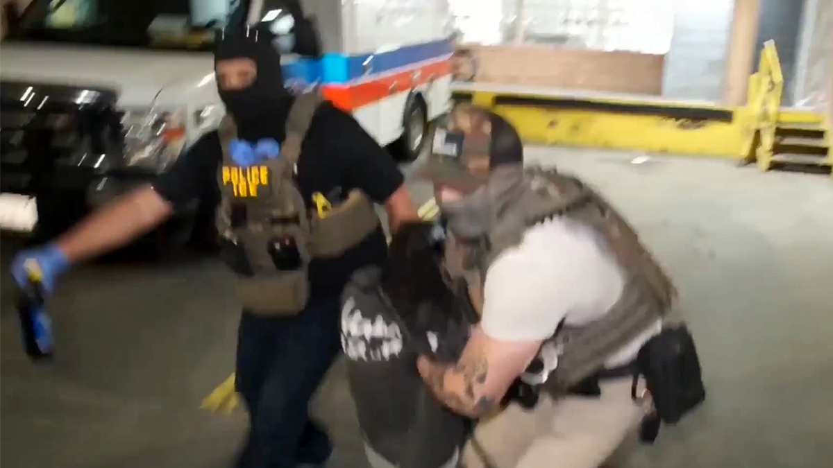 ICE pulling a migrant in New York