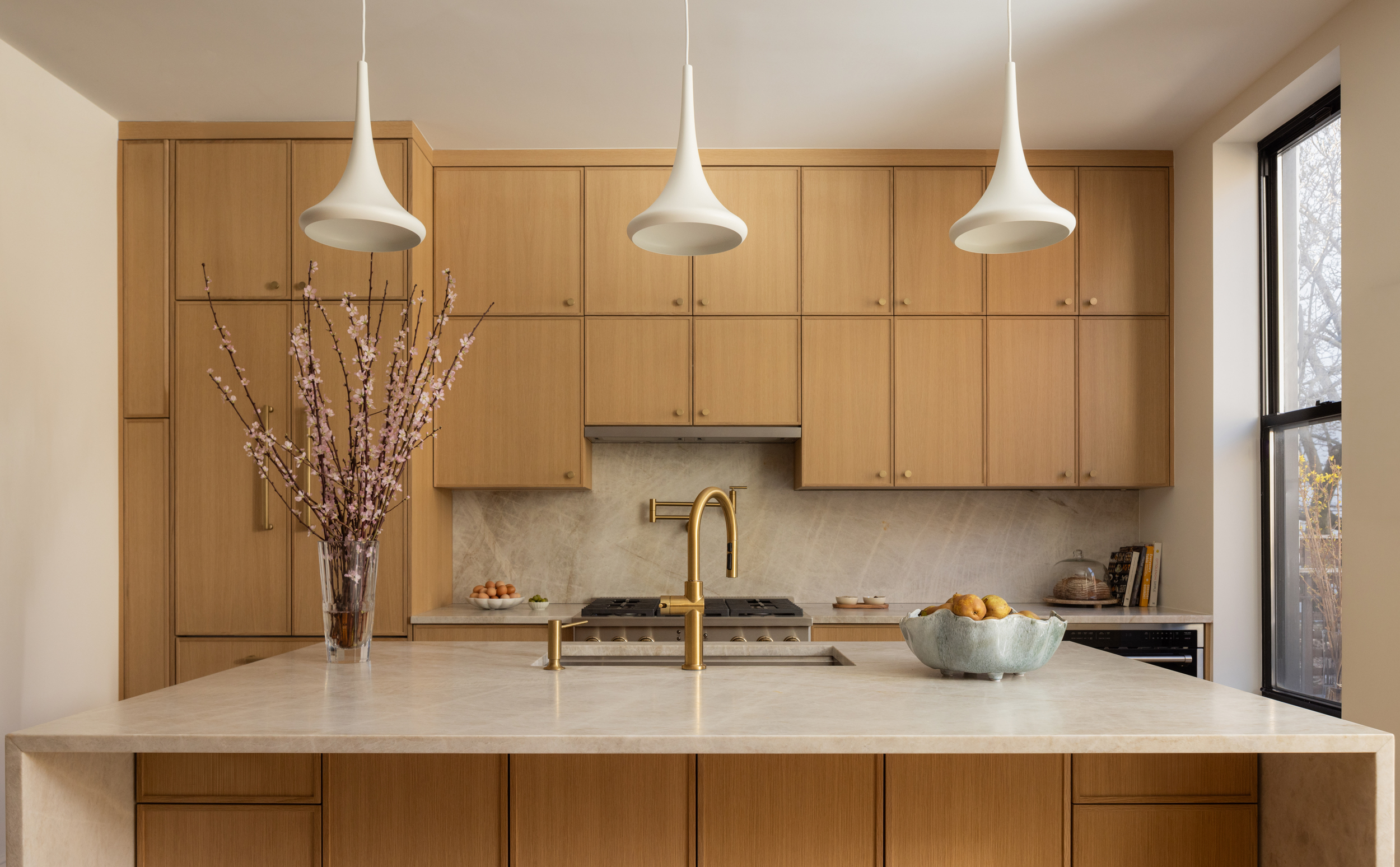 HEAD ONE VIEW OF MAIN KITCHEN WALL THREE PENDANT FIXTURES