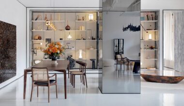 A furniture showroom with seating and lit display shelves