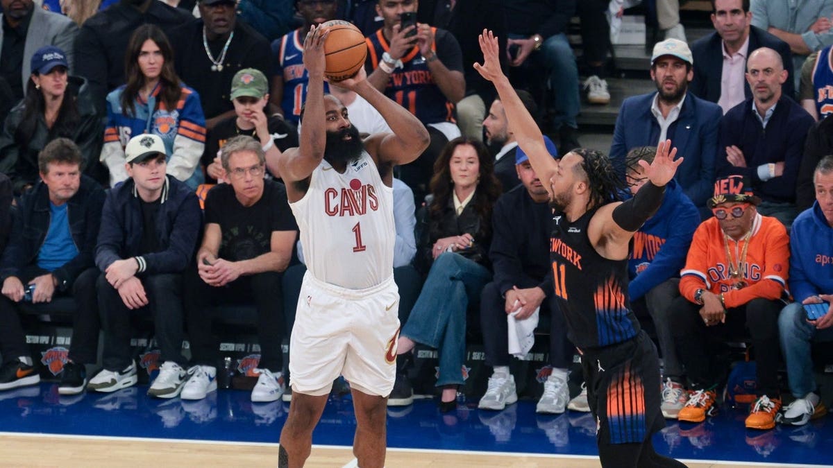 Cleveland Cavaliers PG James Harden chucks a 3-pointer over New York Knicks PG Jalen Brunson during Game 2 of their conference finals series in the 2026 NBA playoffs.