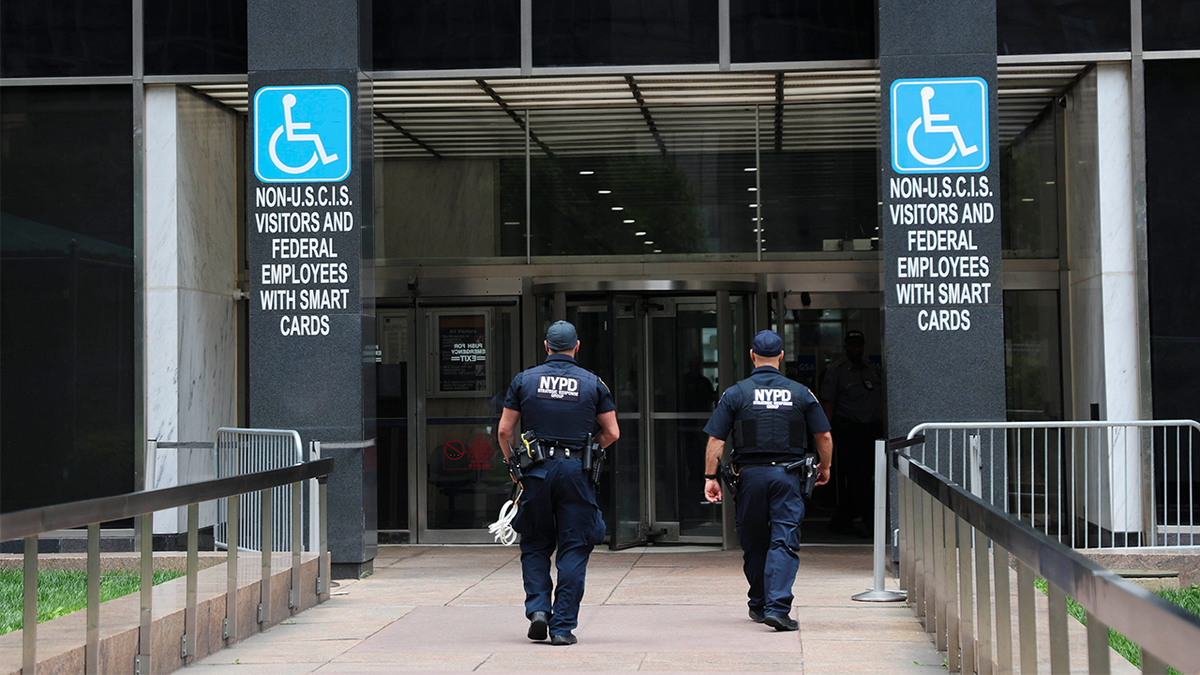Members of the NYPD Strategic Response Group entering 26 Federal Plaza in New York