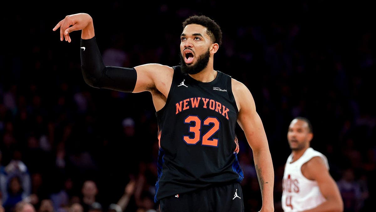 Karl-Anthony Towns celebrating after making a basket during an NBA game at Madison Square Garden