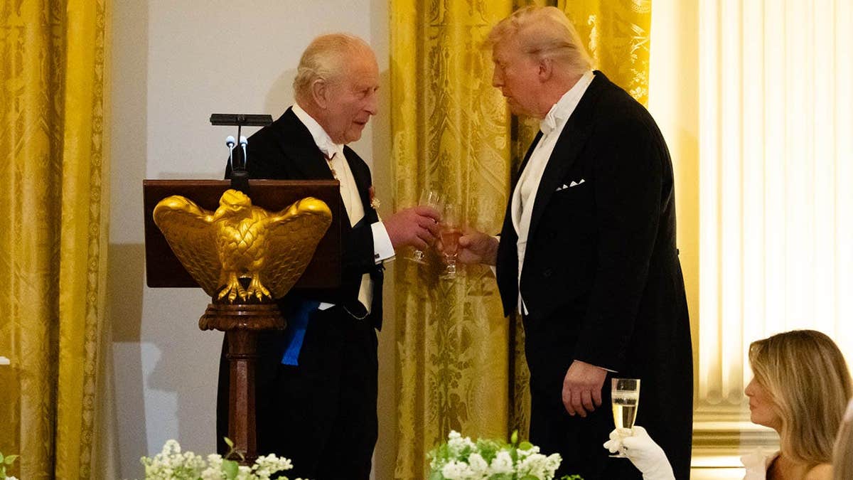 King Charles III and President Donald Trump toasting in the East Room of the White House