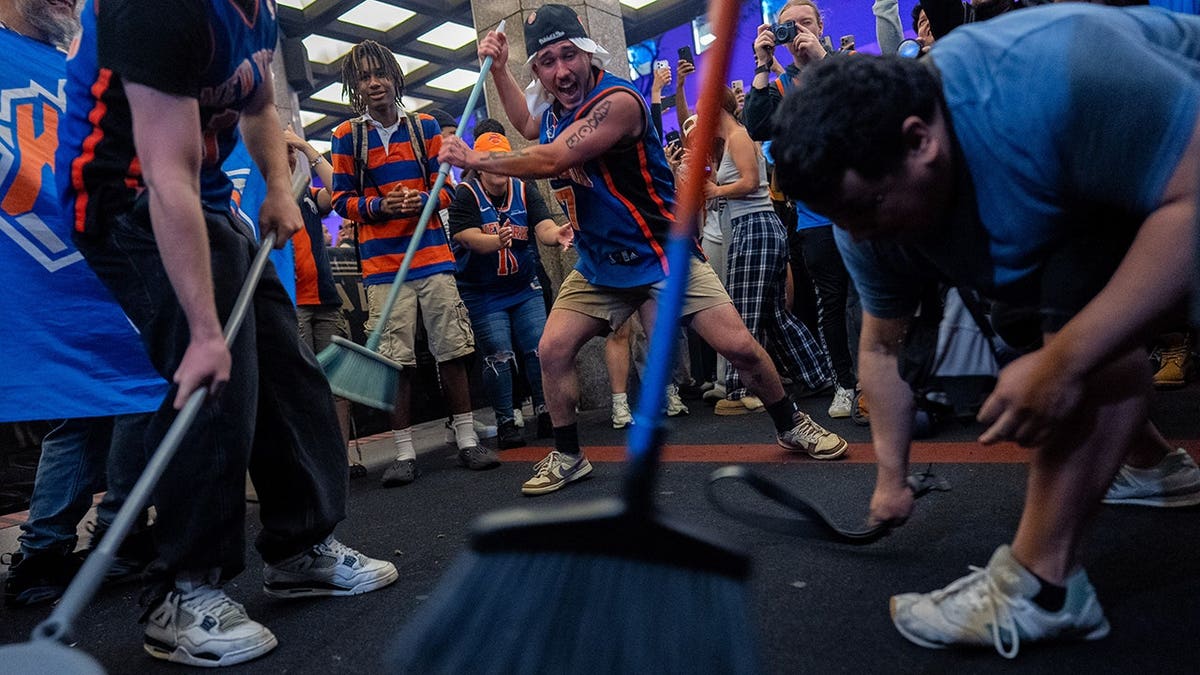 Knicks fans celebrating winning the eastern conference championship in New York City