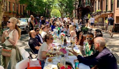 Roughly 1,300 people gathered at tables along Remsen Street and Montague Terrace in Brooklyn Heights for Saturday’s Longest Table 2026 pot luck. Photo: Mary Frost/Brooklyn Eagle