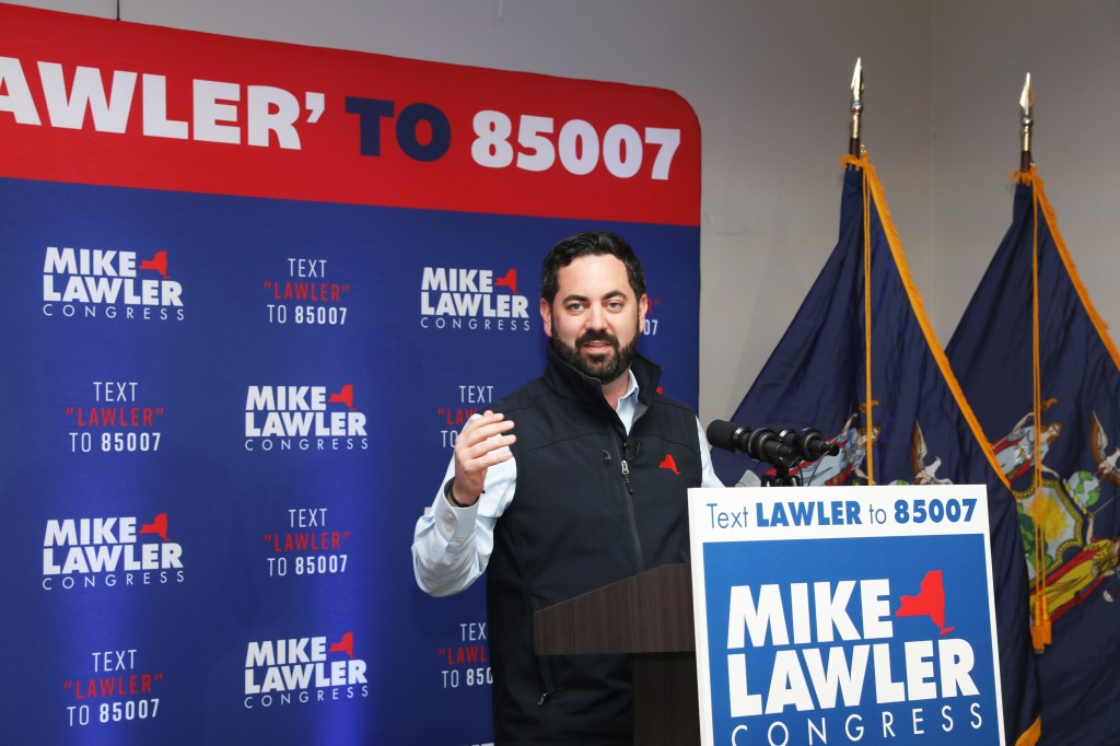 Rep. Mike Lawler speaking at his re-election campaign event.