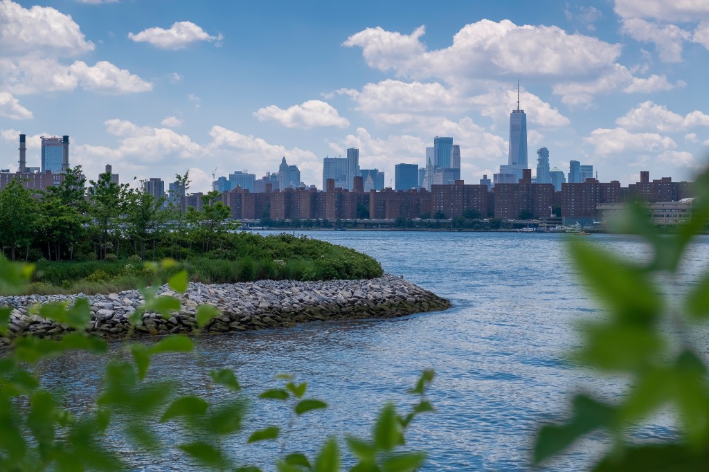 Manhattan skyline and East River viewed from Hunter's Point South Park in Long Island City, Queens, NY