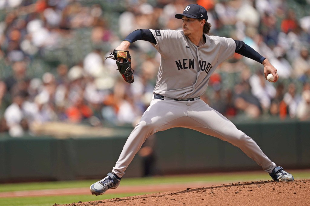 New York Yankees pitcher Max Fried (54) delivers the ball.