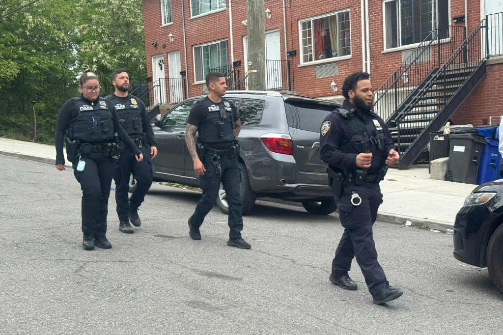 Four police officers investigating a shooting at NYCHA’s Boston Secor Houses.