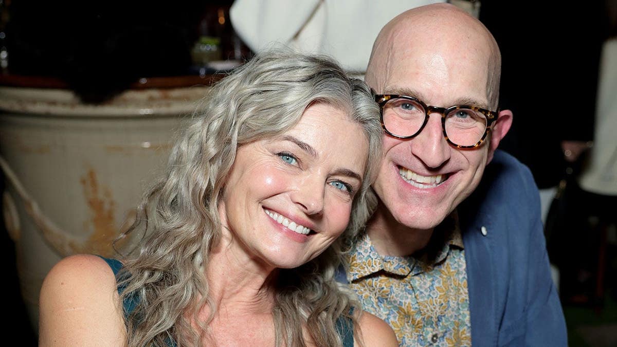 Paulina Porizkova and Jeff Greenstein standing together at Chateau Marmont event