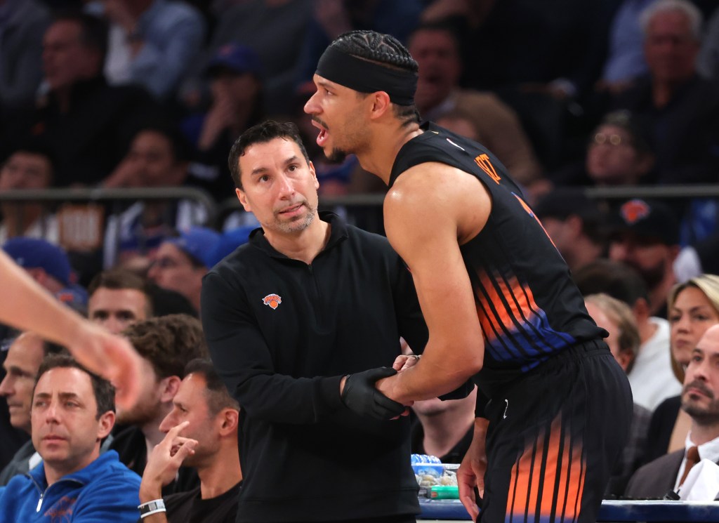 New York Knicks guard Josh Hart #3 has his hand checked by a trainer during the third quarter.