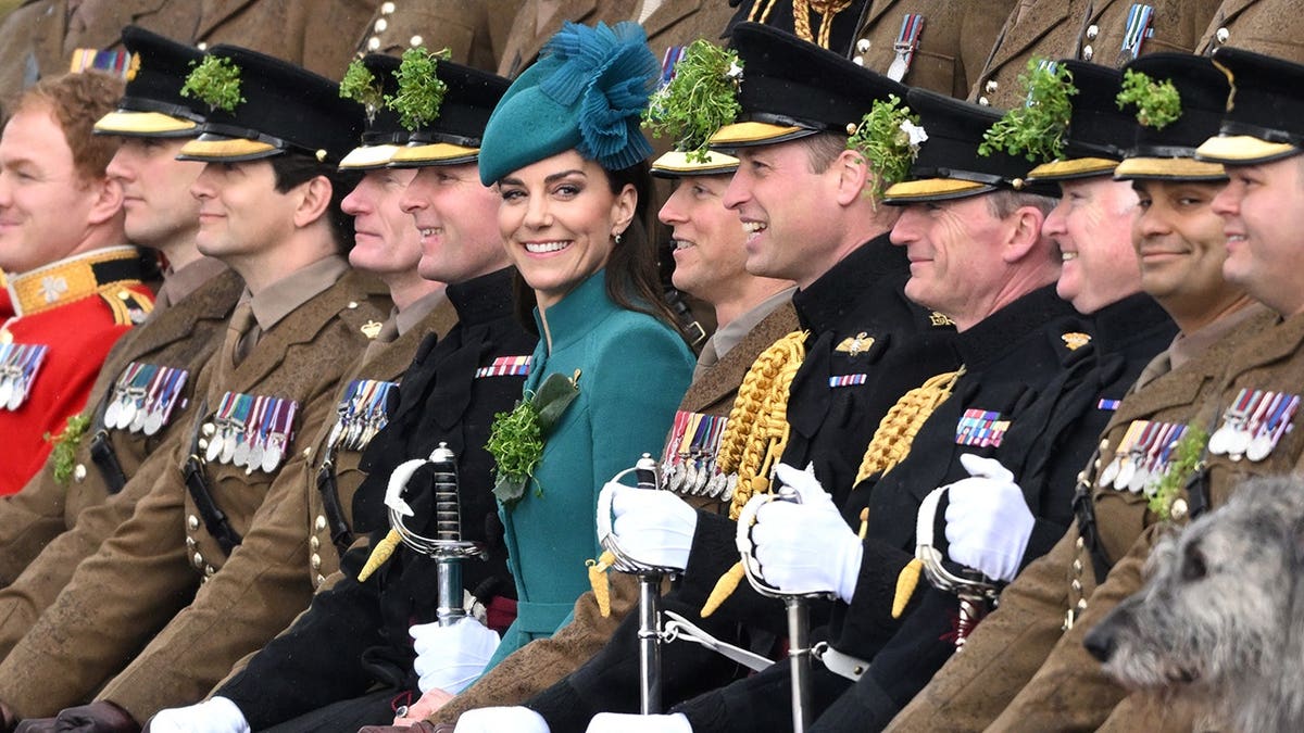 Prince William and Catherine pose with 1st Battalion Irish Guards at St. Patrick's Day Parade in Aldershot