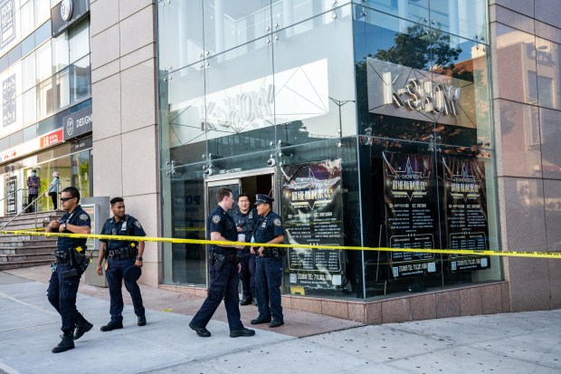 Police investigate after Dominick Malvert was fatally shot on 138th St. in Queens on Aug. 13, 2021. (Theodore Parisienne for New York Daily News)