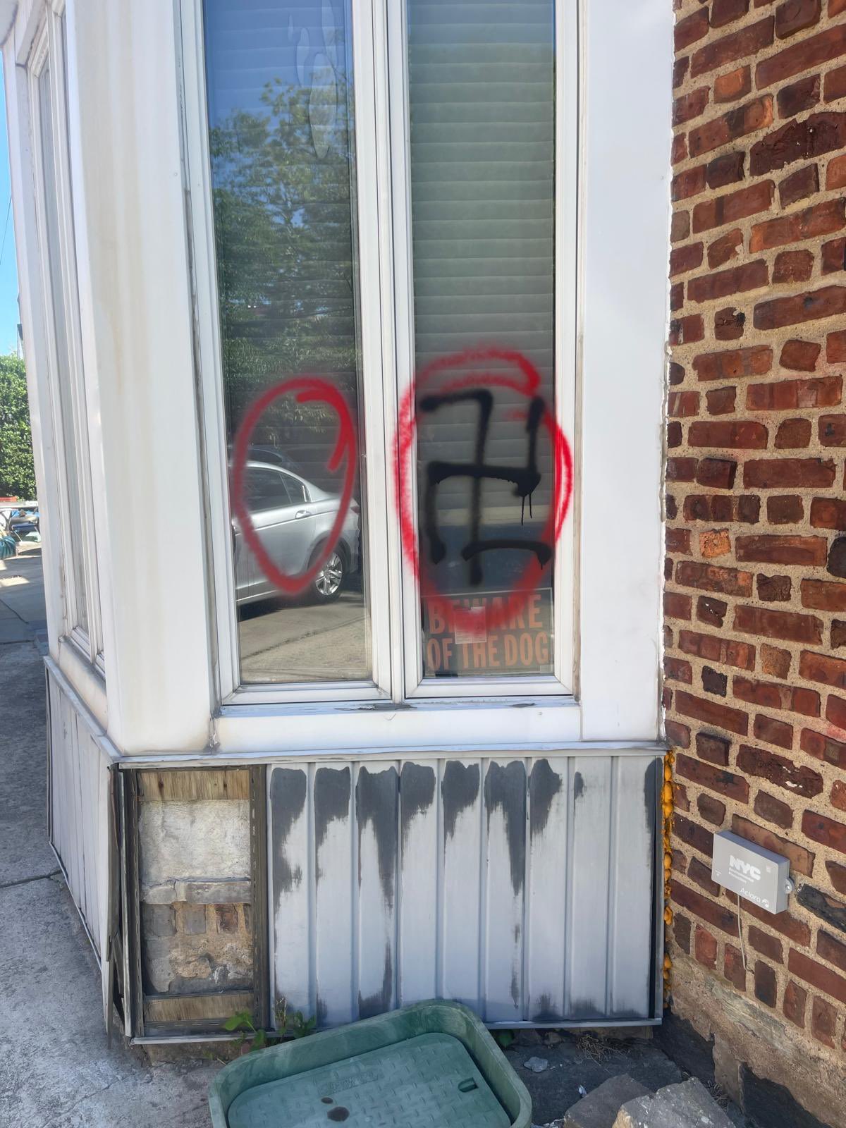 The window of a home vandalized with antisemitic graffiti, in the Queens borough of New York City, May 4, 2026. Credit: Office of New York City Council Speaker Julie Menin.