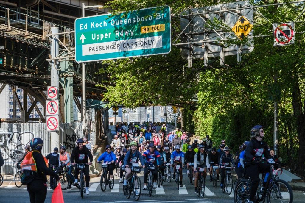 Cyclists come off the Queensboro Bridge in the Annual Five Boro Bike Tour on May 3, 2026 in New York City.