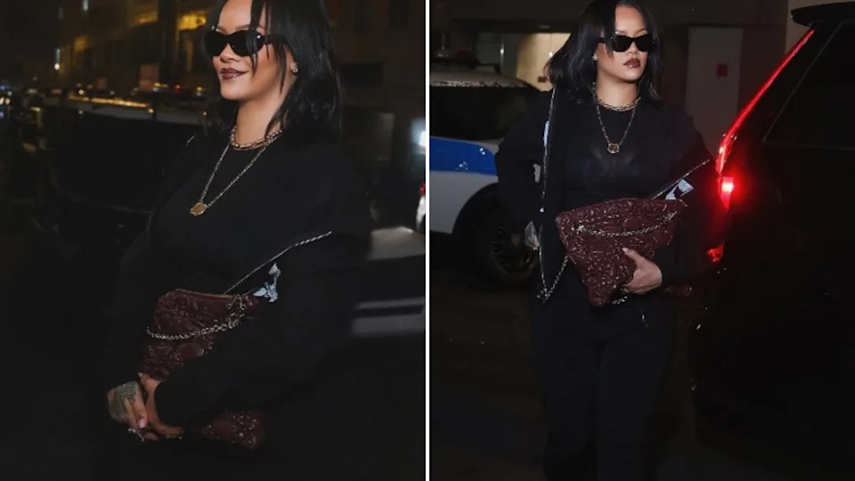 Rihanna kept her city style clean with black layers and a bold oversized bag.