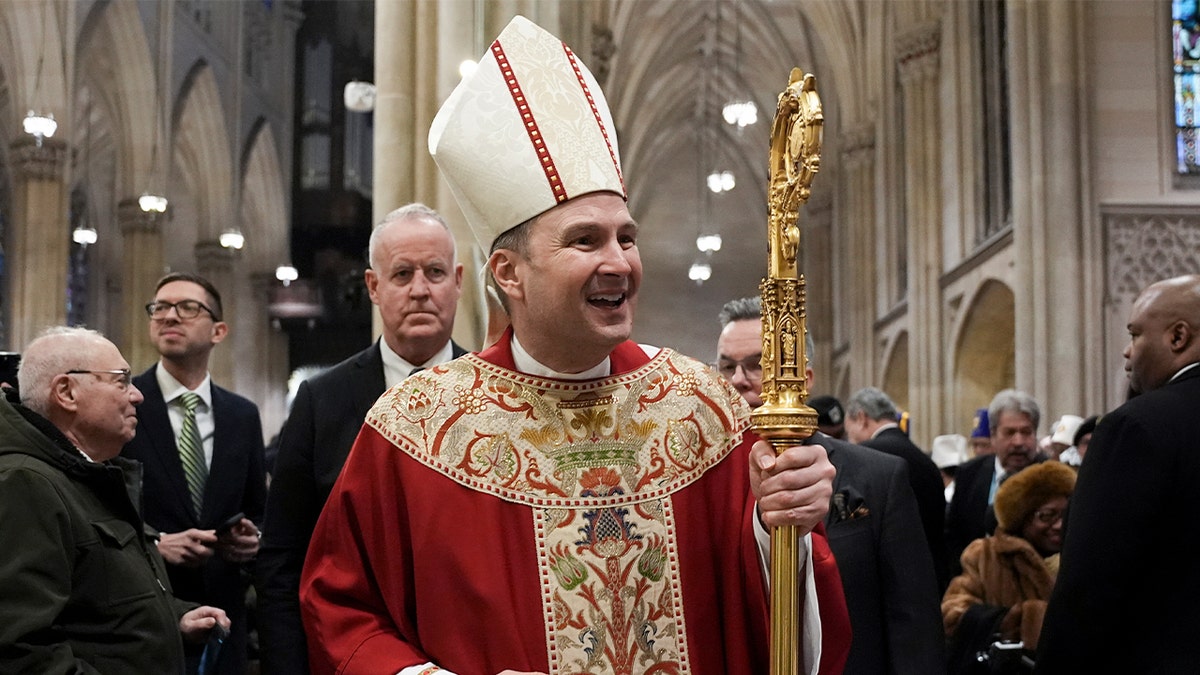 New York Archbishop Ronald A. Hicks leaving St. Patrick's Cathedral after installation Mass
