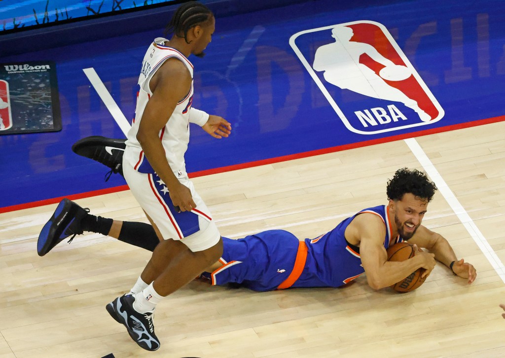 New York Knicks guard Landry Shamet (44) falls with the ball as Philadelphia 76ers guard Tyrese Maxey (0) gives chase during the second quarter.