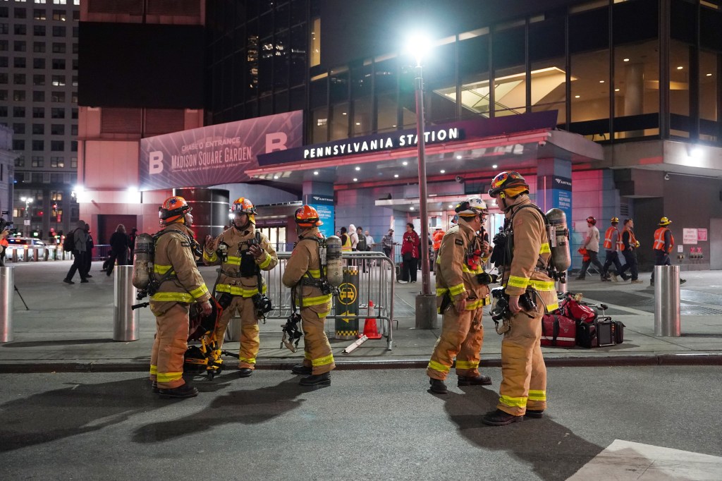 Firefighters outside Penn Station in Midtown Manhattan after responding to a train fire on May 29, 2026.