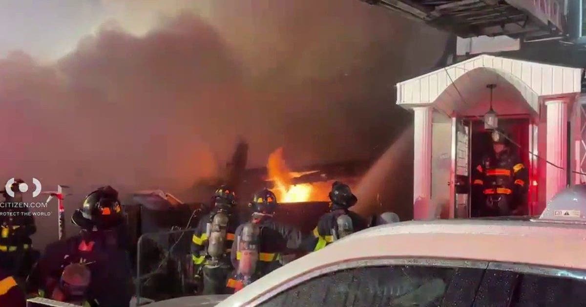 Queens fire: Body found; suspect status unclear