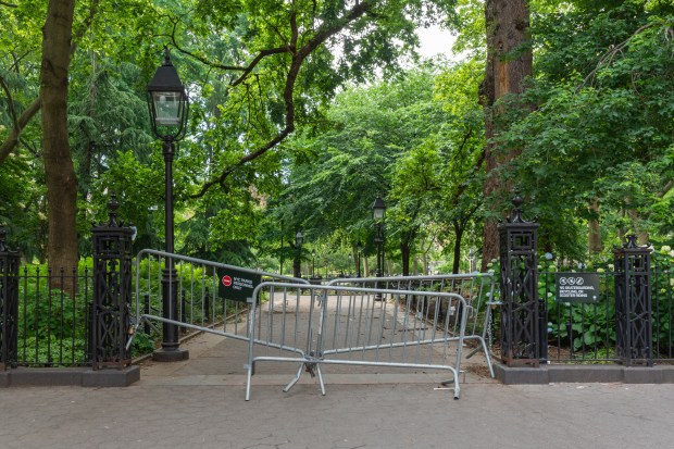 Police barricades block an entrance to Washington Square Park in this file photo. (Shutterstock)