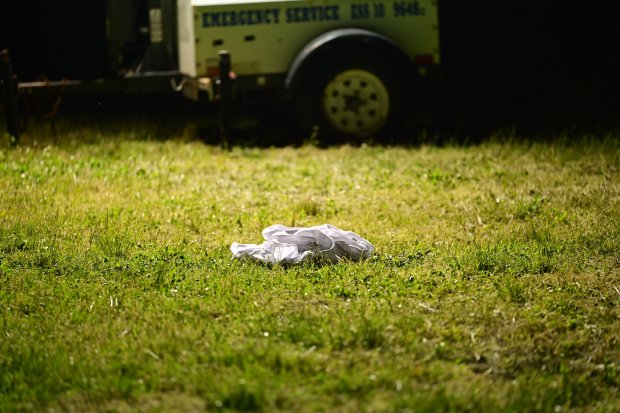 NYPD officers investigate following the discovery of the body of Albert Itzkowitz, who was found dead along the Kissena Lake shoreline with multiple gunshot wounds, in Queens, New York, on May 18, 2026. (Kyle Mazza/NurPhoto/Shutterstock)