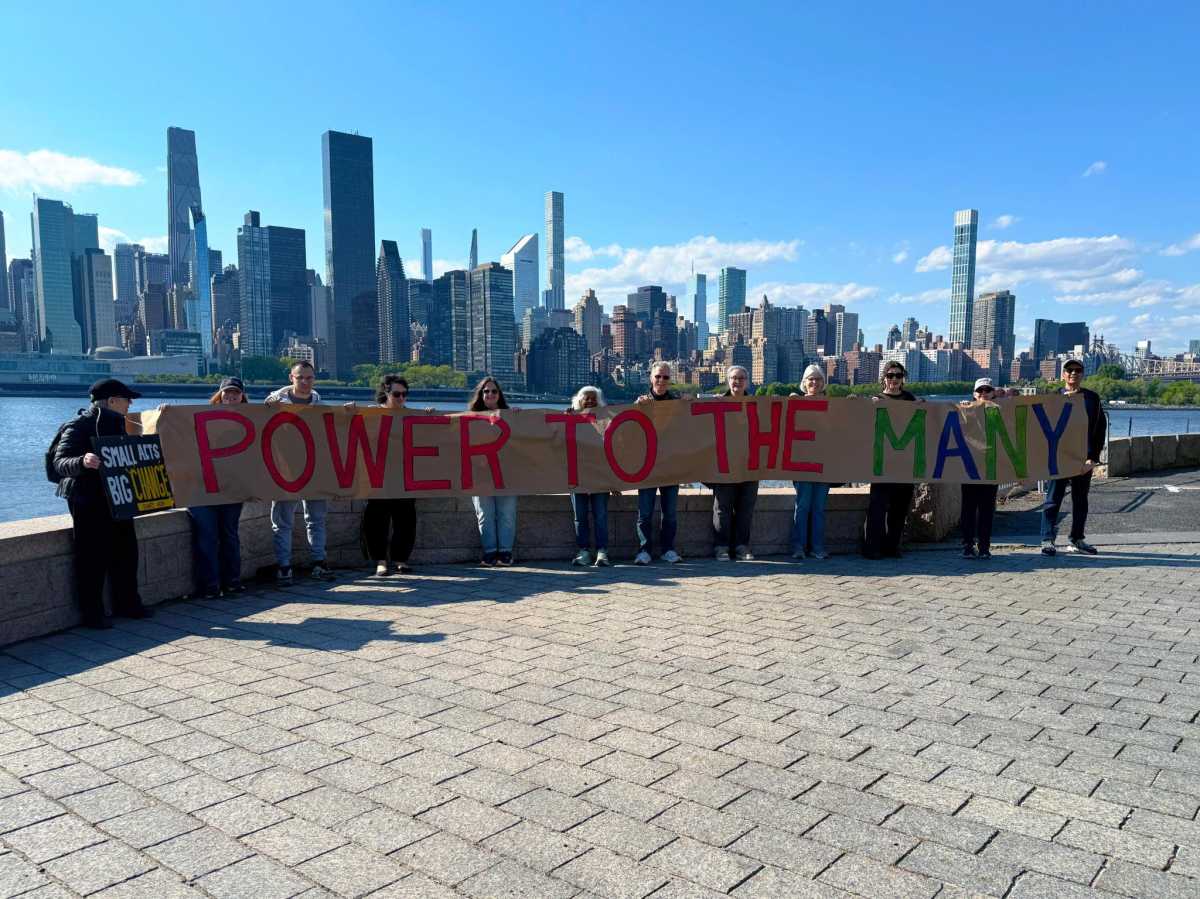 Small group of western Queens residents takes part in nationwide May Day Strong calling for ‘Workers over Billionaires’ – QNS