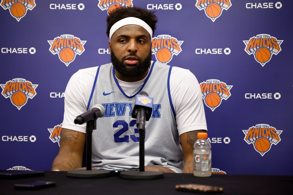 Mitchell Robinson speaking at a press conference after New York Knicks practice.
