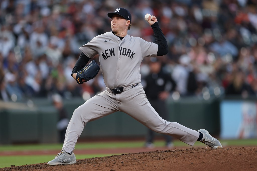 Ryan Weathers #40 of the New York Yankees pitching against the Baltimore Orioles.