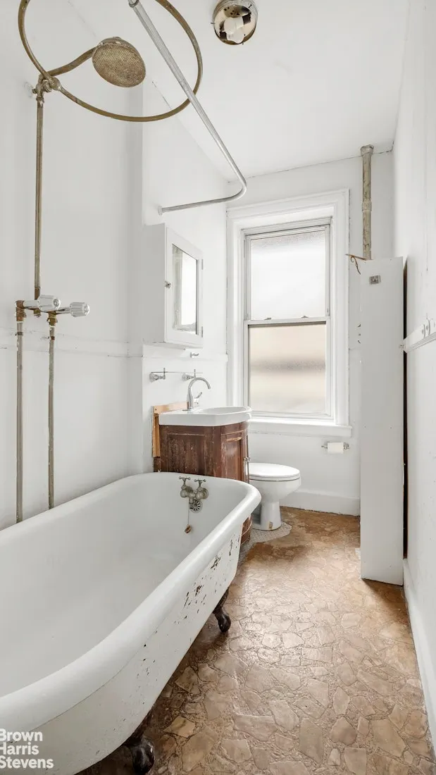 bathroom with claw foot tub
