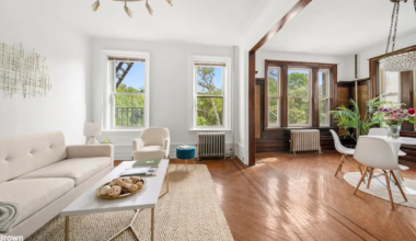 sunset park living room with view into a dining room with wainscoting