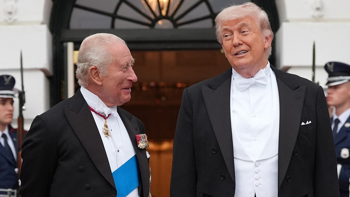 President Donald Trump greeting Britain's King Charles III at the White House South Portico