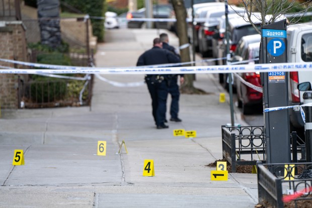 Police investigate after Robert Williams, 20, was fatally shot outside the now-closed Umbrella Hotel in Kew Gardens, Queens on Jan. 1, 2021. Richard Swygert, convicted of the killing, was sentenced on Friday, May 22, 2026. (Theodore Parisienne for New York Daily News)