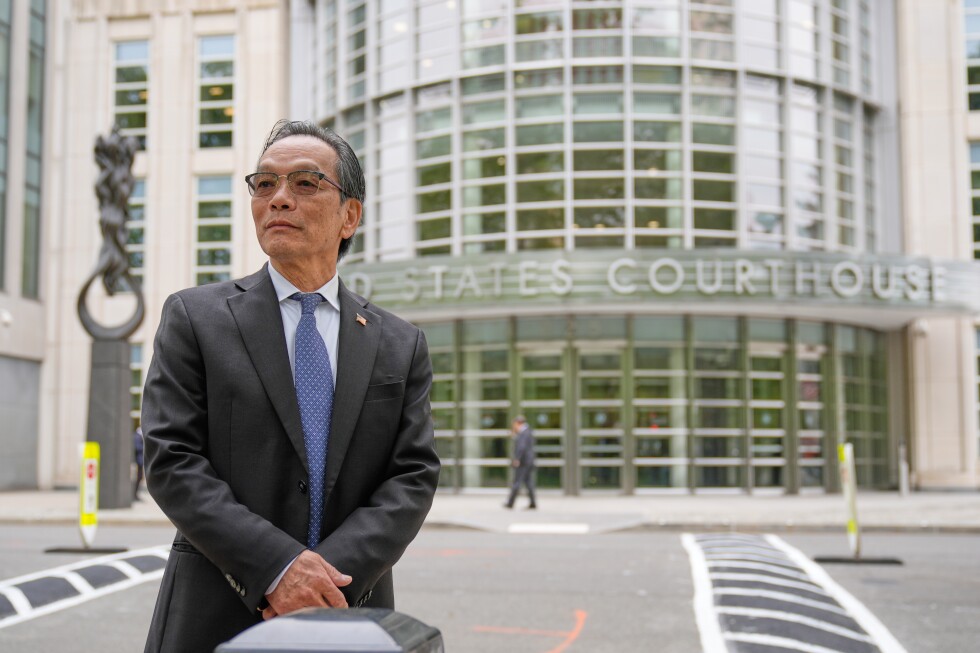 Man accused of running a Chinese spy outpost in NYC goes on trial