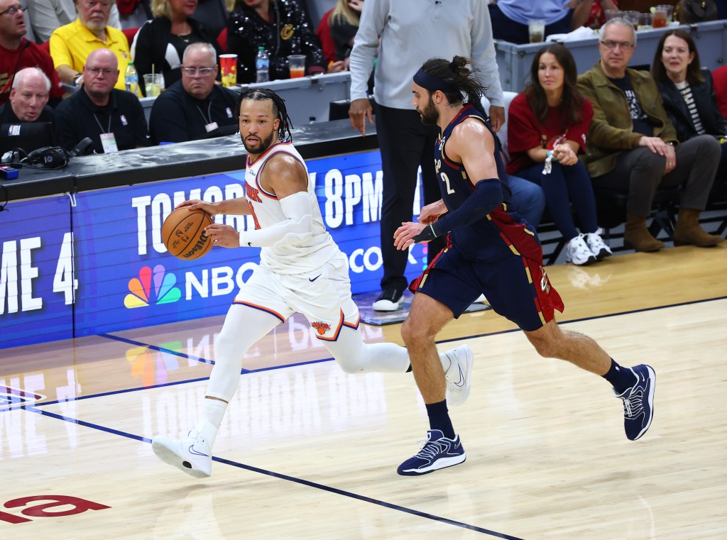 Jalen Brunson #11 of the New York Knicks dribbles the ball during the game against the Cleveland Cavaliers during Game Three of the 2026 Eastern Conference Finals on May 23, 2026 at Rocket Arena in Cleveland, Ohio. 