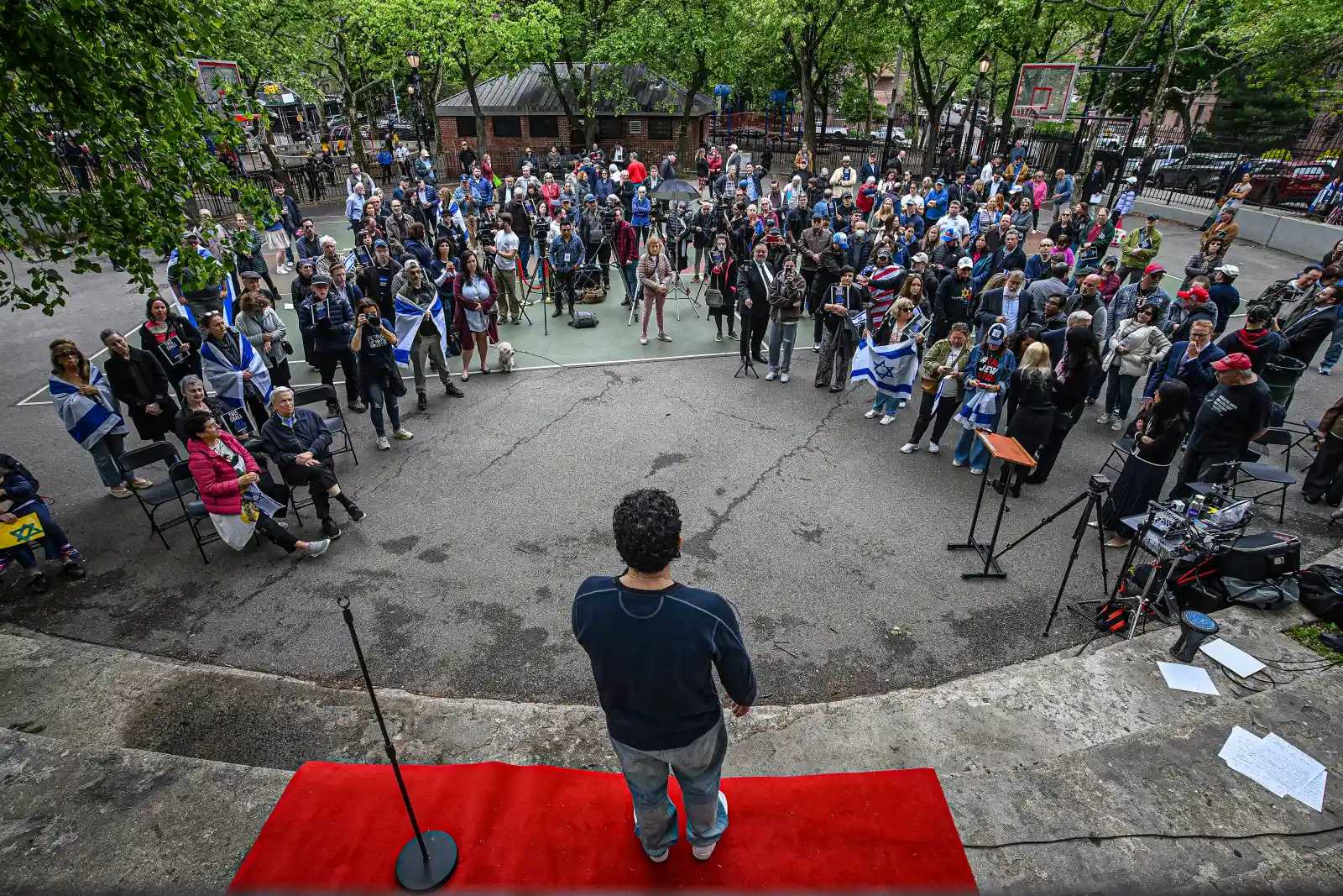 Members of the Queens Jewish community railed on May 10 to denounce antisemitism after a group of hateful teenagers scrawled swastikas over synagogues and houses in the Forest Hills and Rego Park areas. 