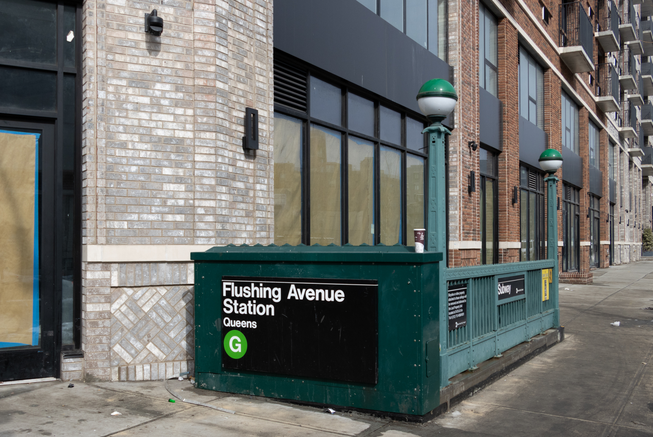 subway entrance with signage for Flushing Avenue
