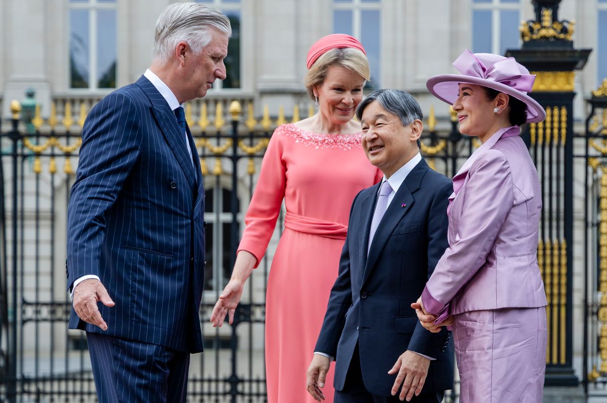The Belgian queen opted for polished daytime elegance as she greeted Japan's imperial couple in Brussels.