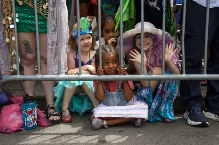 kids in crowd at mermaid parade