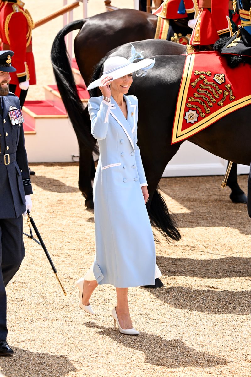 White-trimmed lapels added contrast and sophistication to Kate's impeccably tailored look.