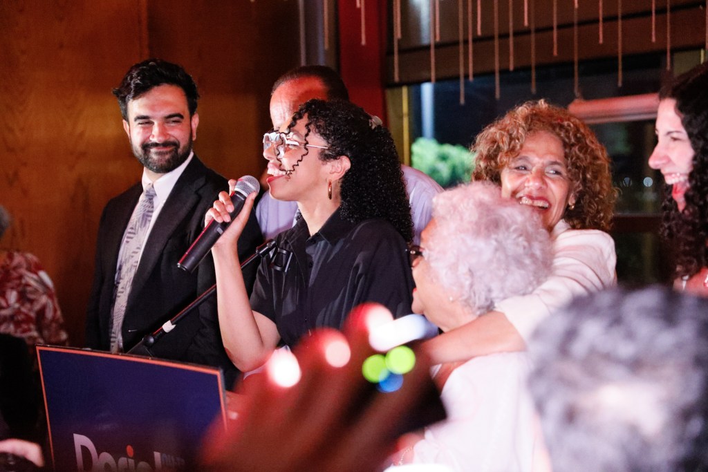 Democratic Congressional candidate Darializa Avila Chevalier delivers her victory speech alongside Mayor Zohran Mamdani during an election night watch party in Hamilton Heights,