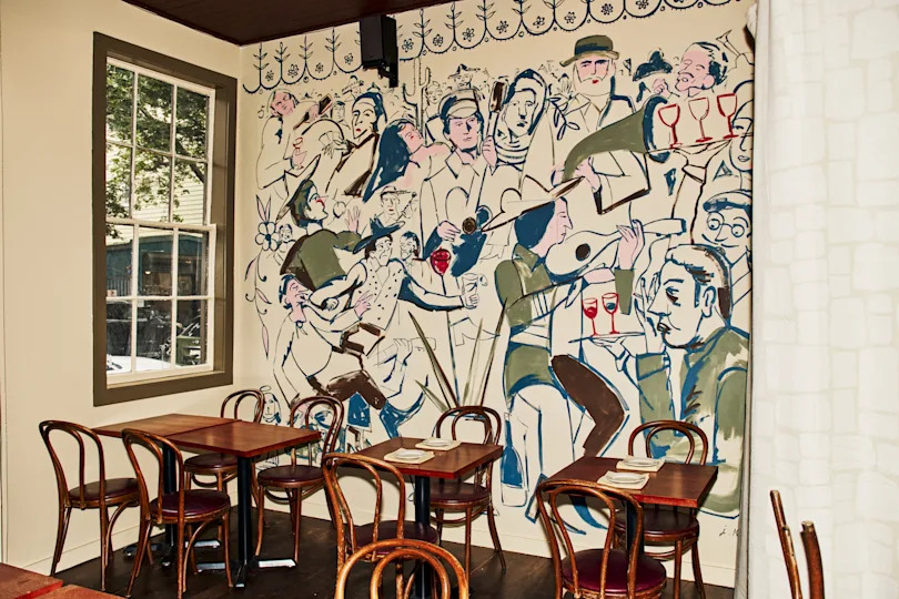 A mural on a wall of a restaurant.
