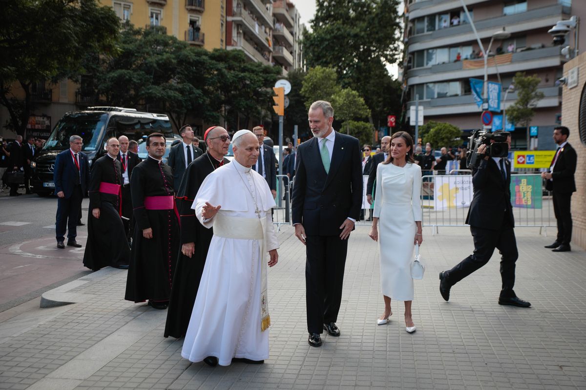 Pope Leo XIV arrives at the Sagrada Família after greeting crowds during a popemobile tour through Barcelona.