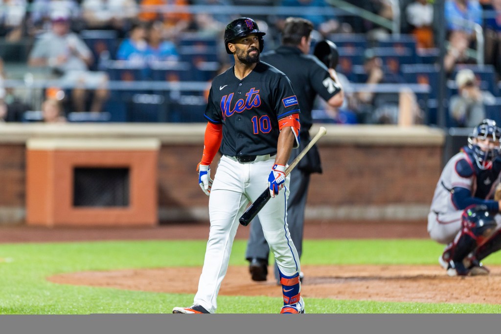 New York Mets second baseman Marcus Semien (10) reacts after he strikes out.