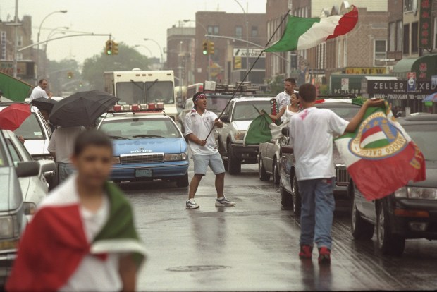 Soccer fans celebrate a World Cup win by Italy in the 1998 World Cup on June 23, 1998 in Bensonhurst.