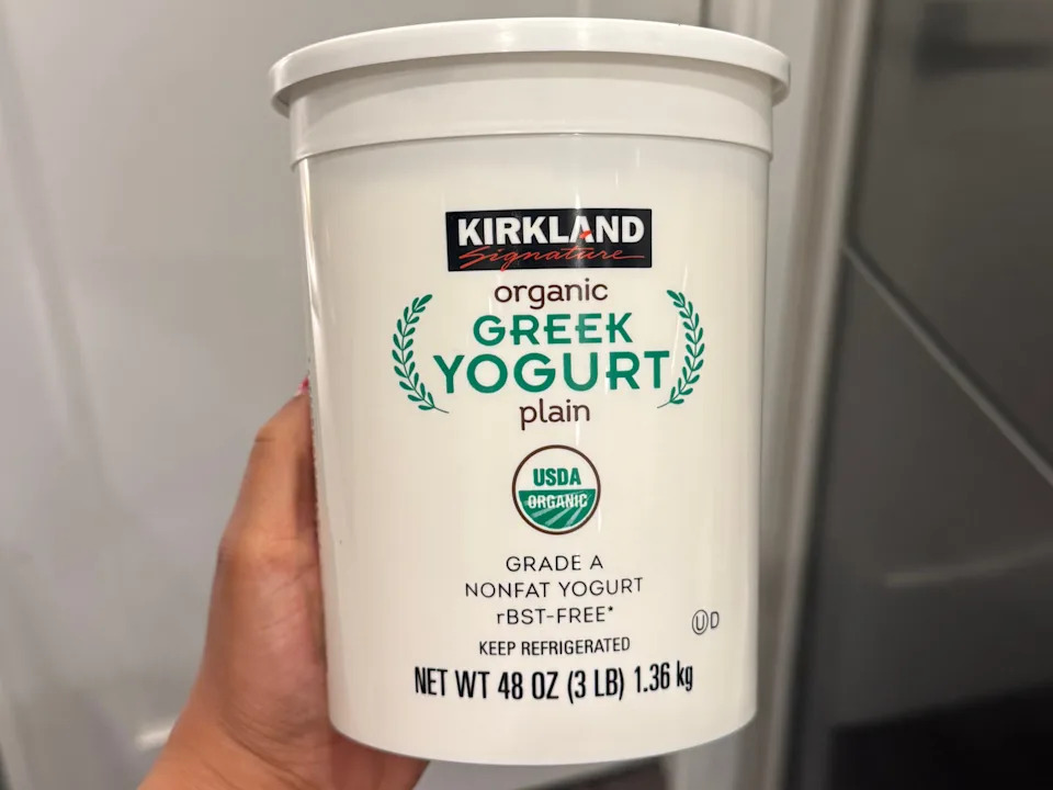 A container of Kirland Signature organic Greek yogurt.