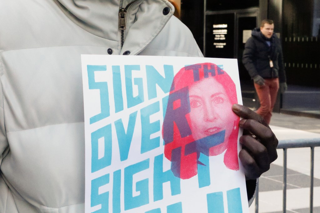 Criminal-justice reform advocates rally outside Gov. Kathy Hochul’s Midtown office to demand she sign a jail and prison oversight bill,